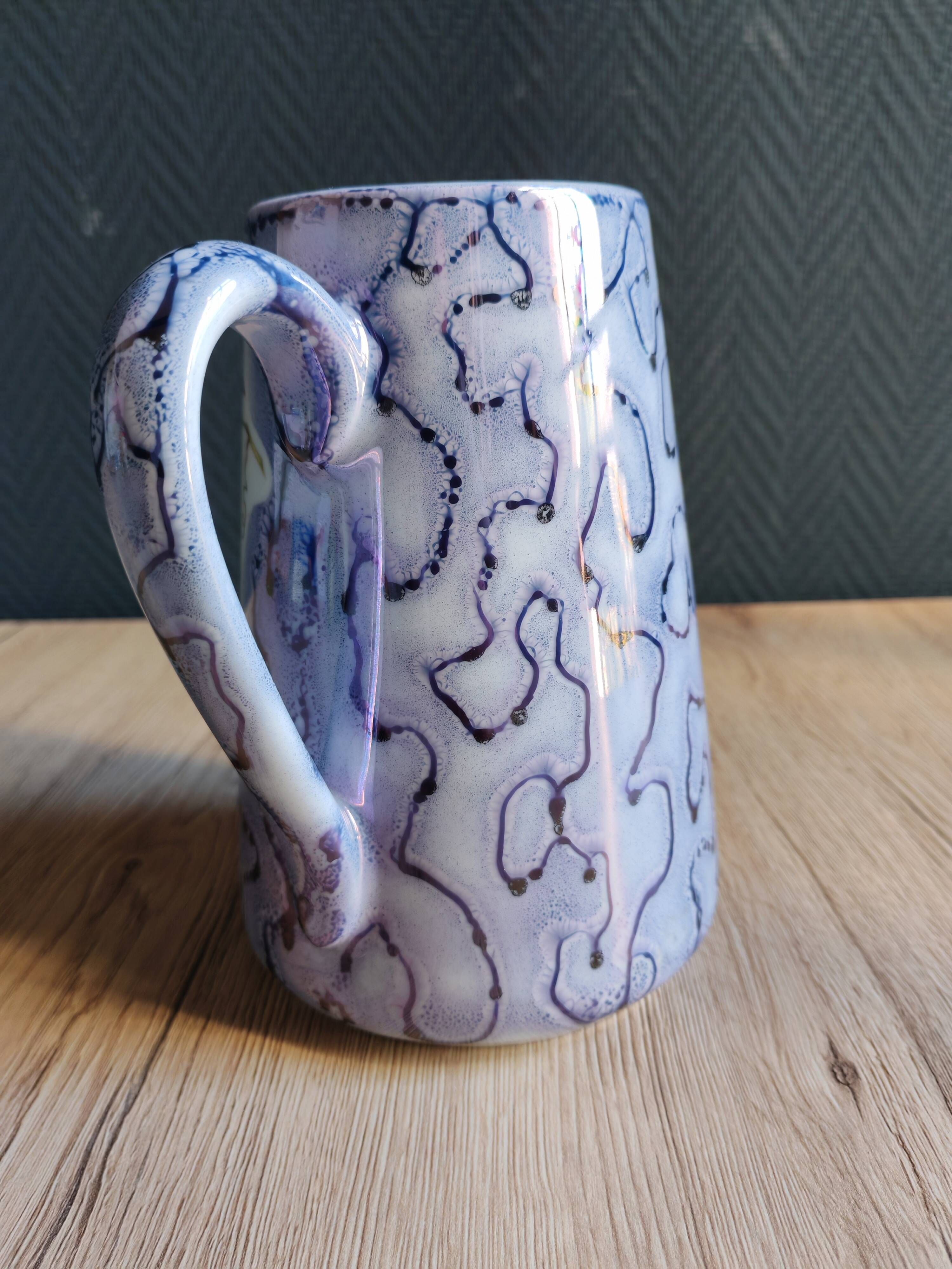 Vintage porcelain pitcher Lusseray France, decorated with grape clusters.