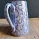 Vintage porcelain pitcher Lusseray France, decorated with grape clusters.