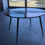 Vintage German round coffee table in sun veneer – W. Germany, an