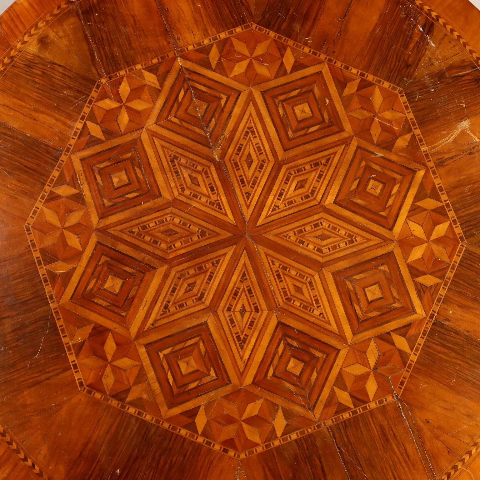 Antique round walnut table with a baluster central leg, Italy, 19th century.