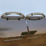 Pair of bedside tables in brass and smoked glass