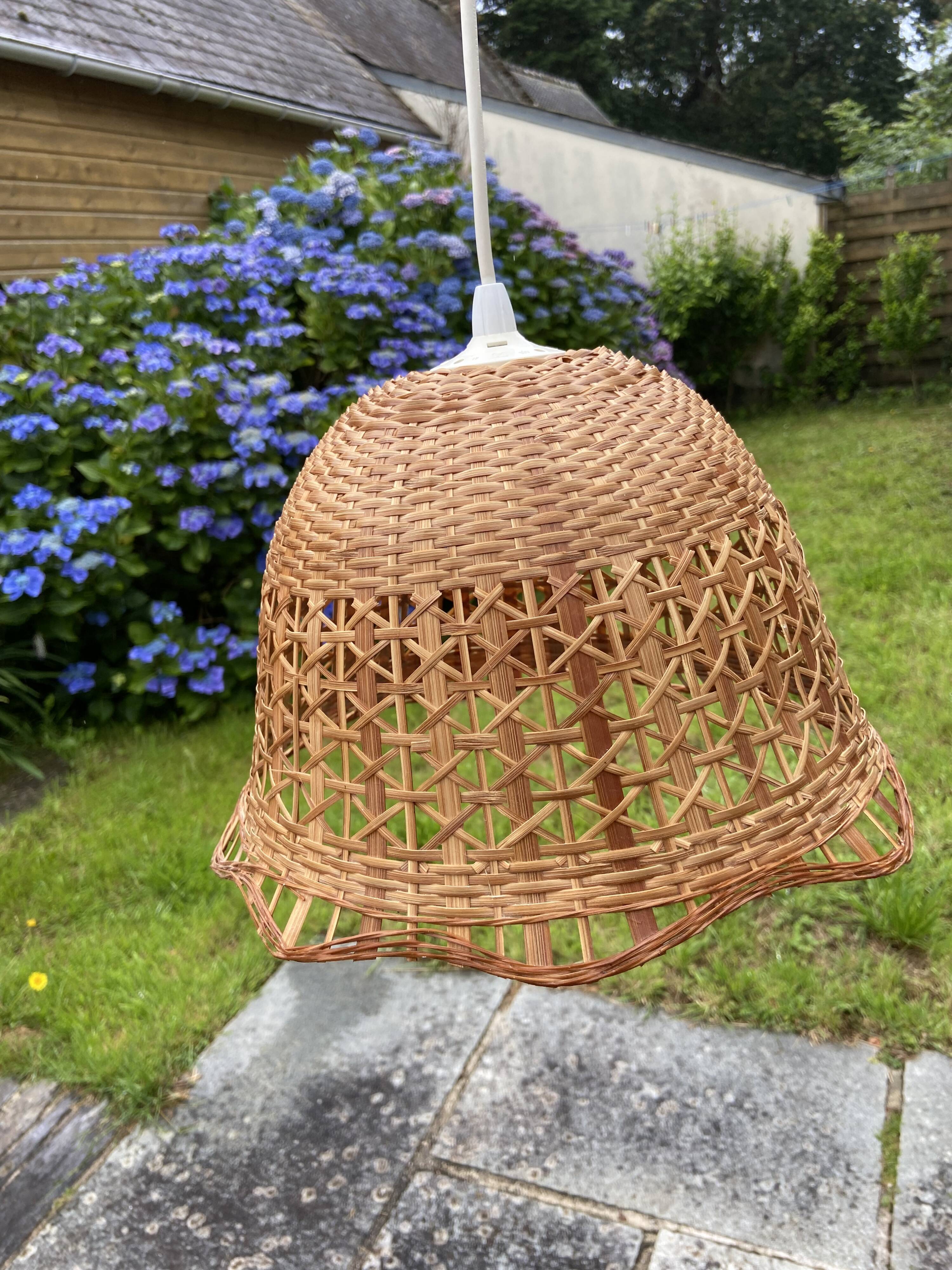 Suspension in rattan and vintage wicker bell shape