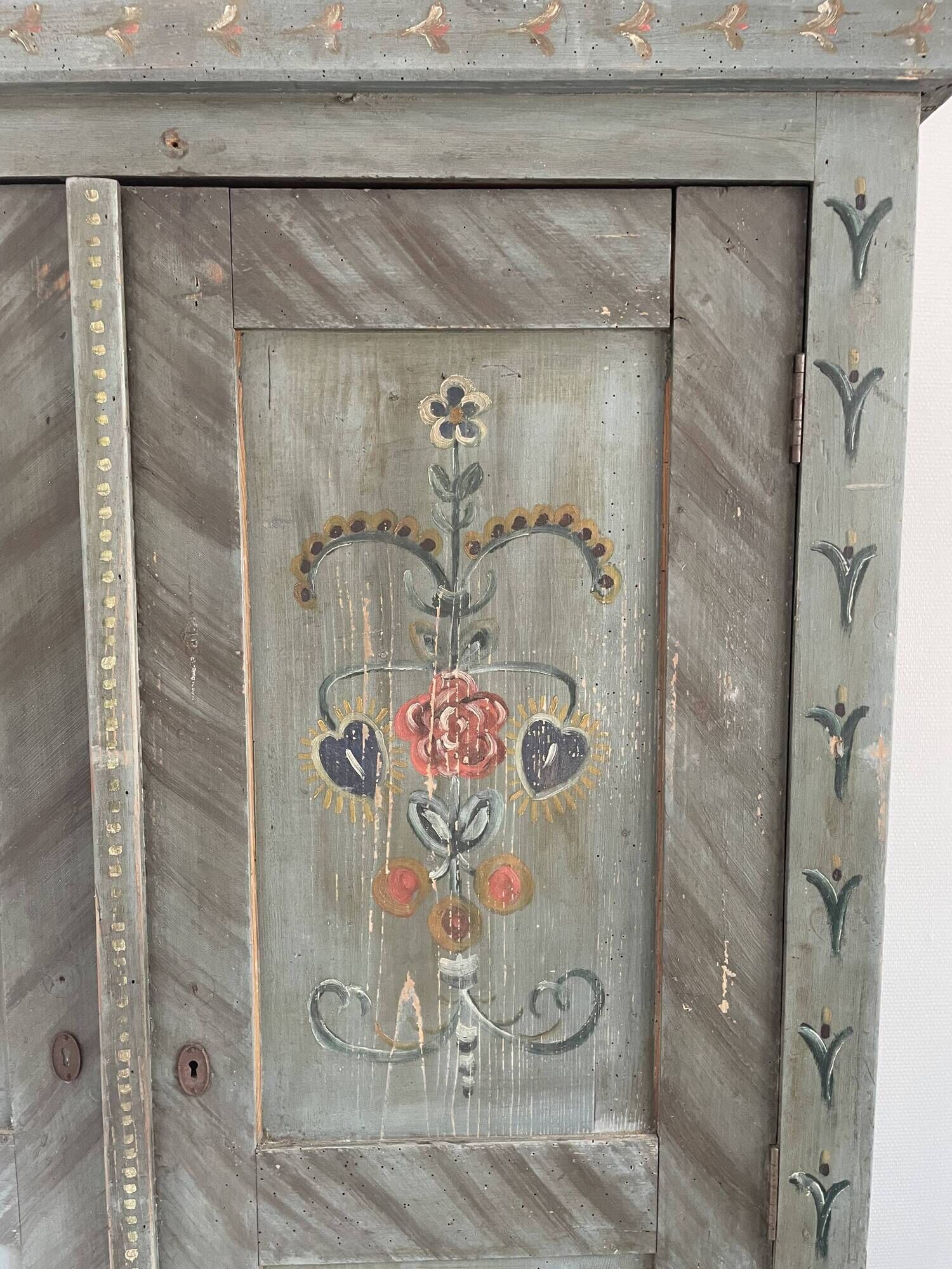 Wedding wardrobe painted in folk art style.