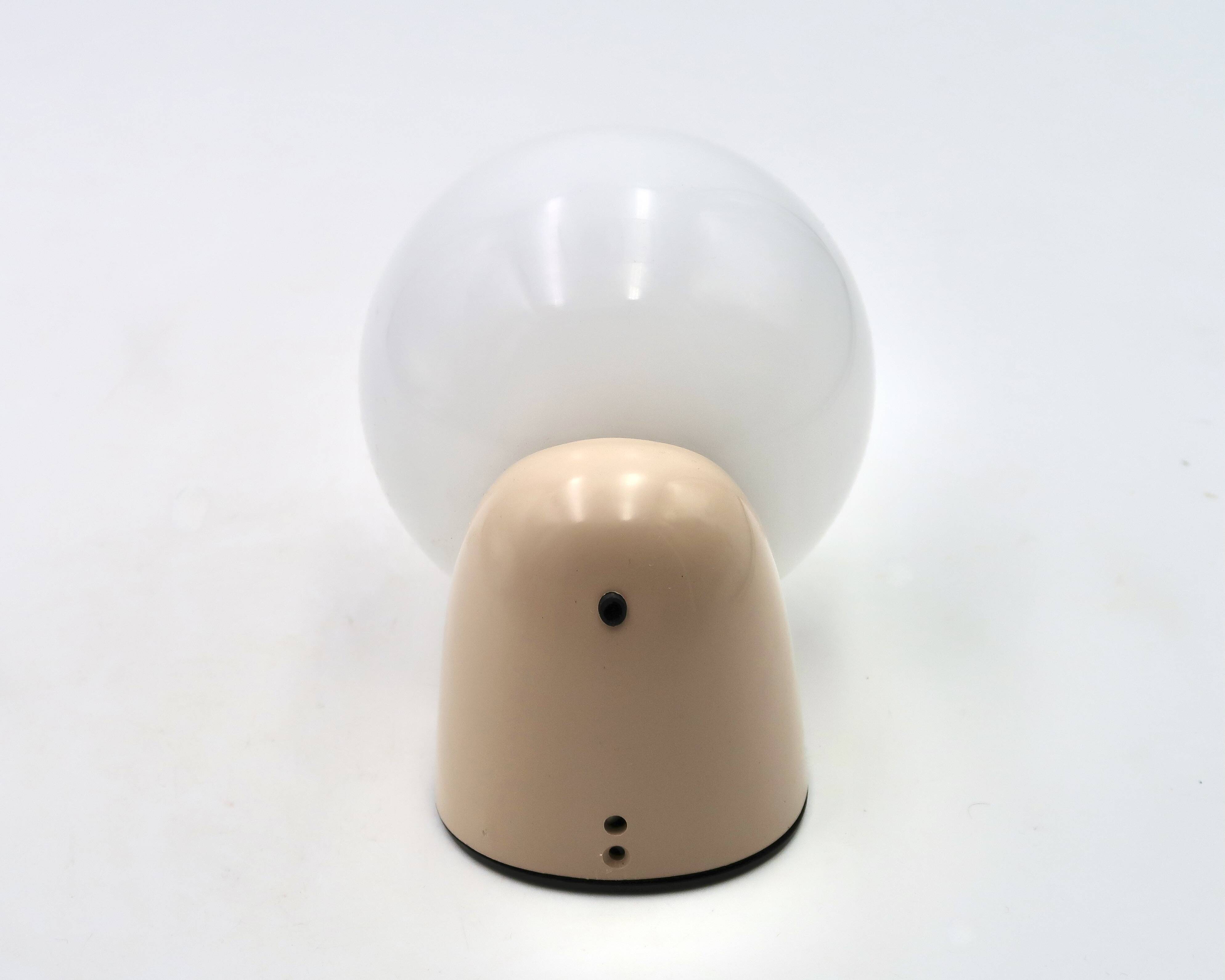 Beige Tissot wall light with opaque white glass globe, 1970s 80s.