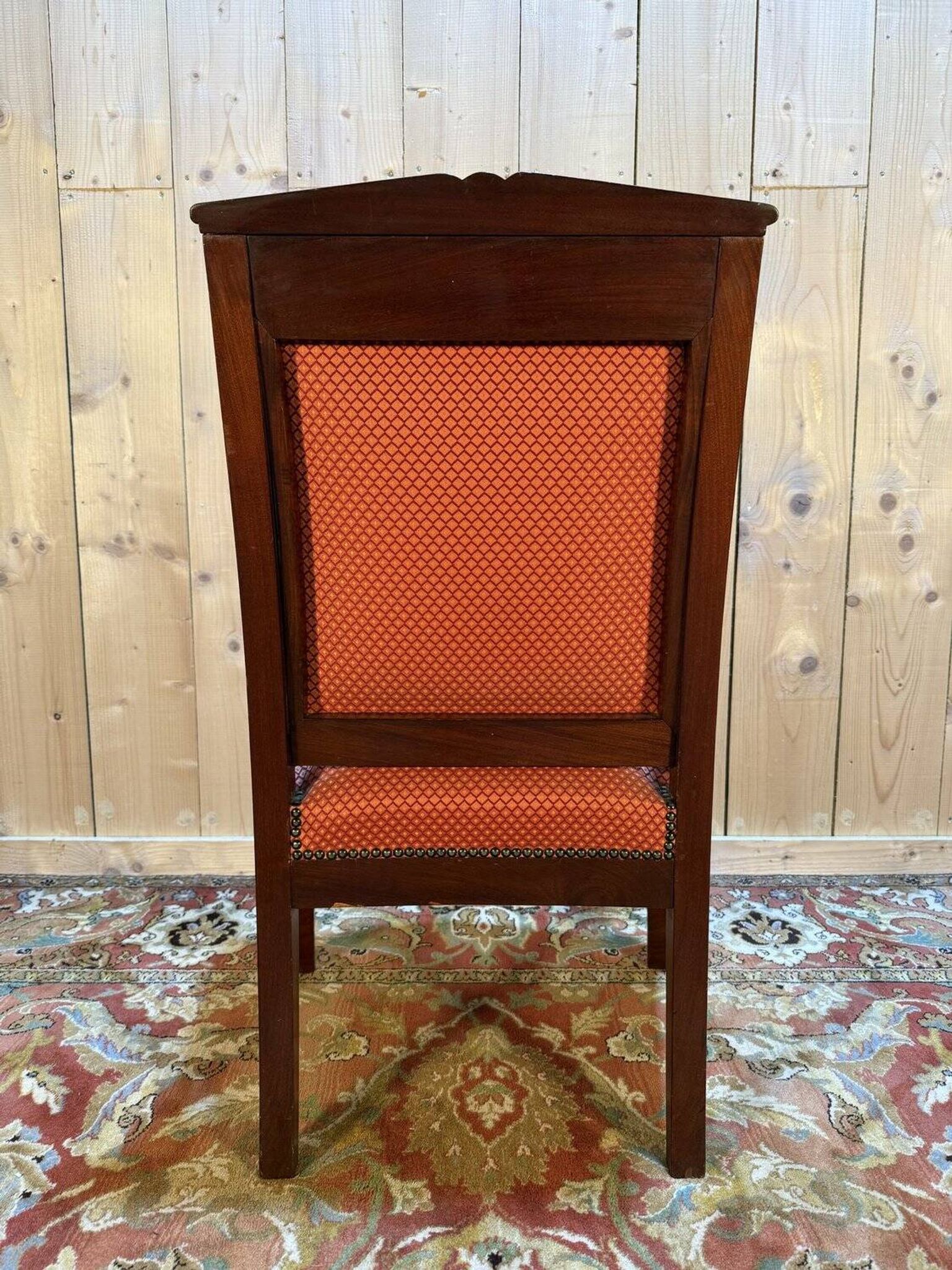 Fauteuil époque Empire en acajou pieds sabres