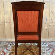Fauteuil époque Empire en acajou pieds sabres