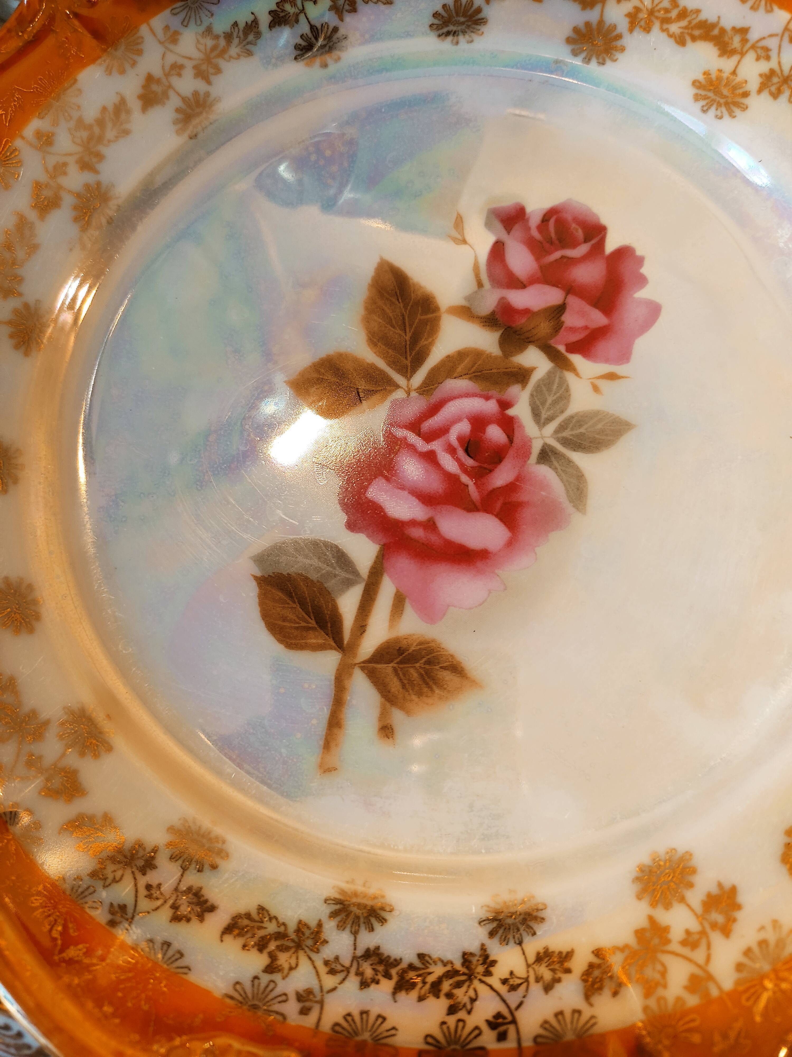 6 mismatched dessert plates decorated with roses