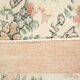 Tapis en laine et coton à décor floral
