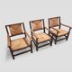Mid-century rustic wooden armchairs with woven seat and back