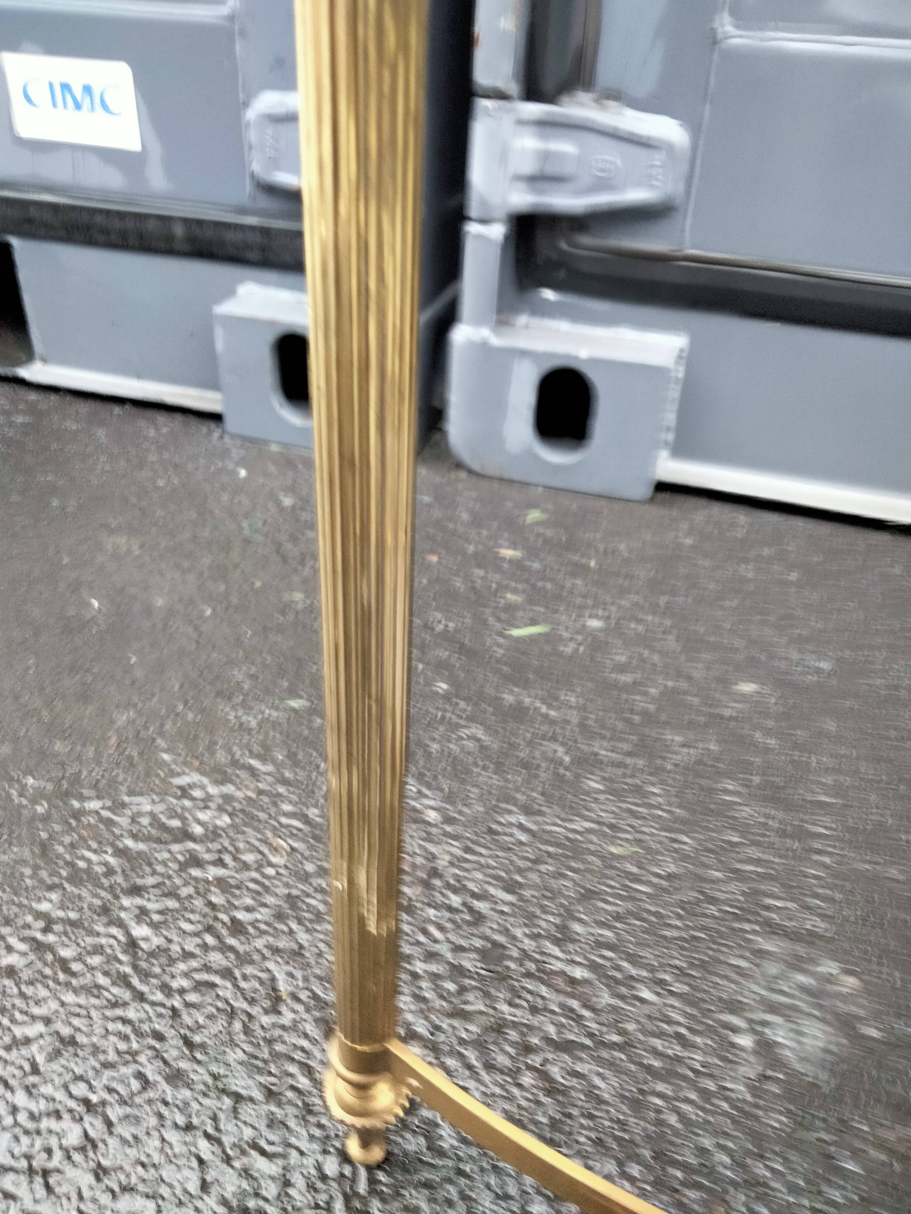 Old vintage gilded side table with marble top