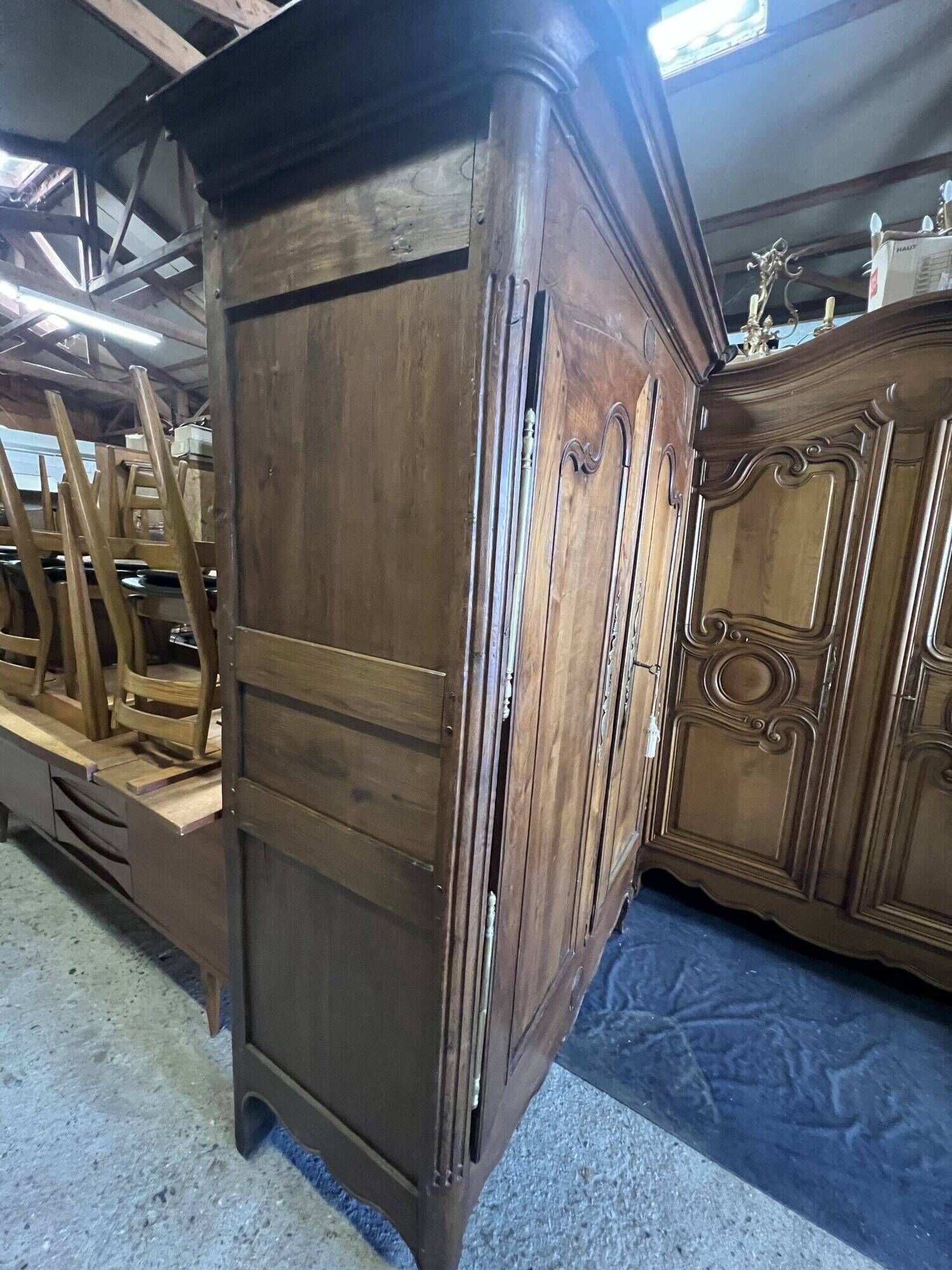 Very beautiful and old carved wooden wardrobe from the 19th century, small size, height 211 cm.