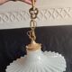 Round pendant light in pleated semi-opaque glass