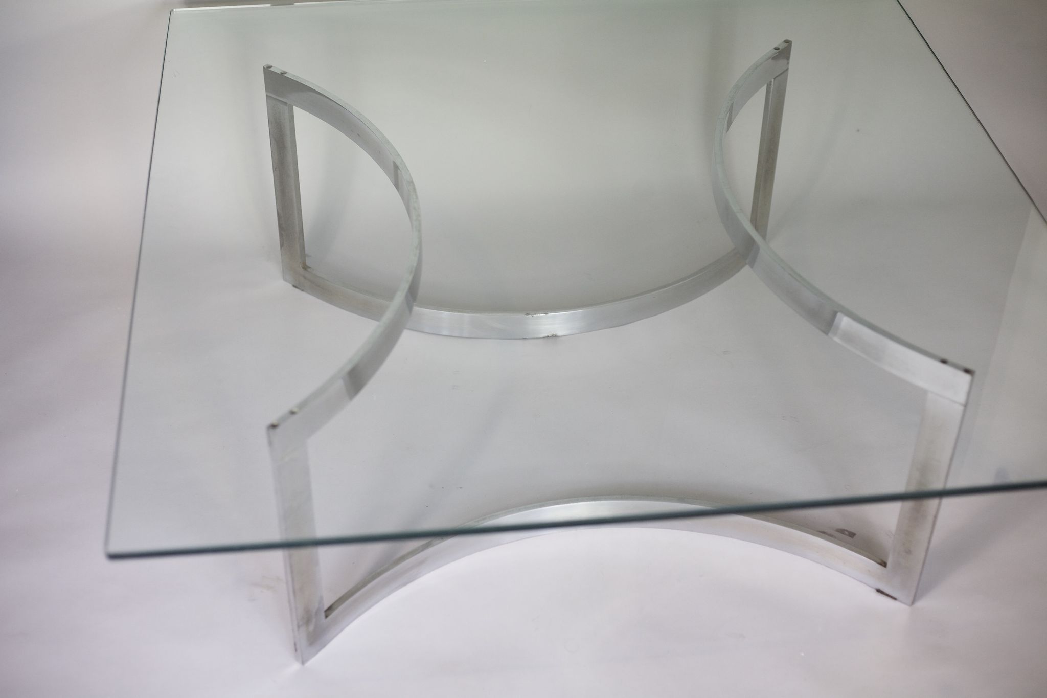 Coffee table published by Dassas, base in chromed steel and thick glass slab, France, 1963