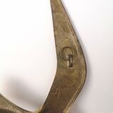 Birds stylized in brass