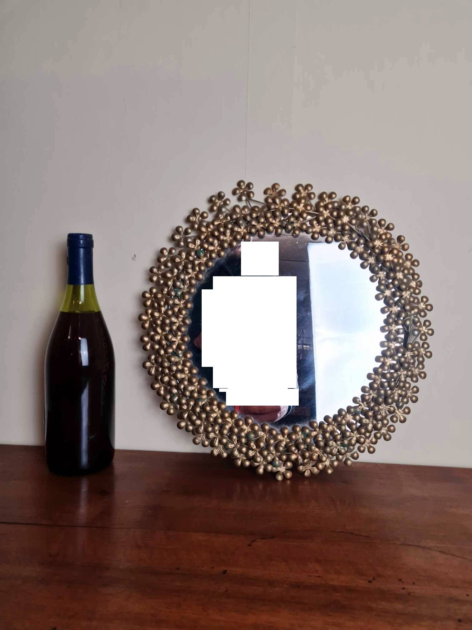 Vintage round mirror in gold metal circa 1950