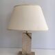 Travertine lamp with brass inlay