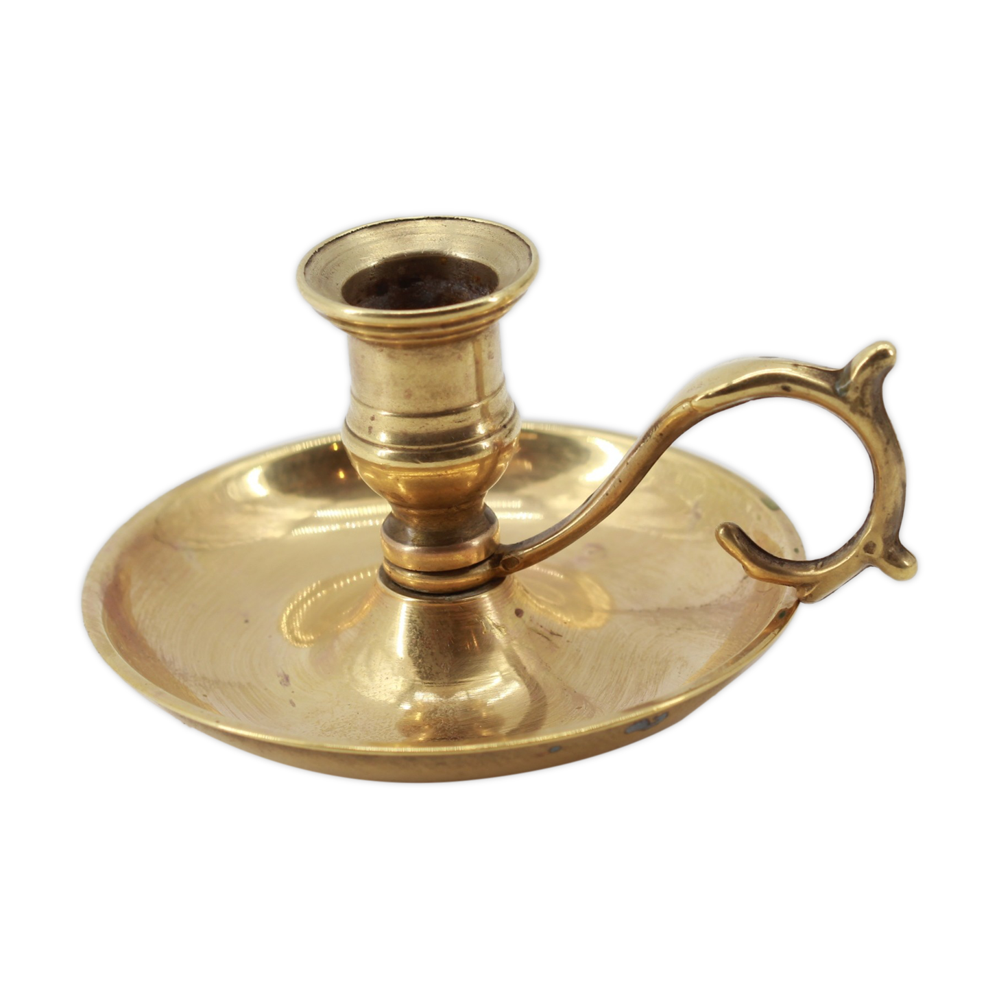 Old brass hand candle holder