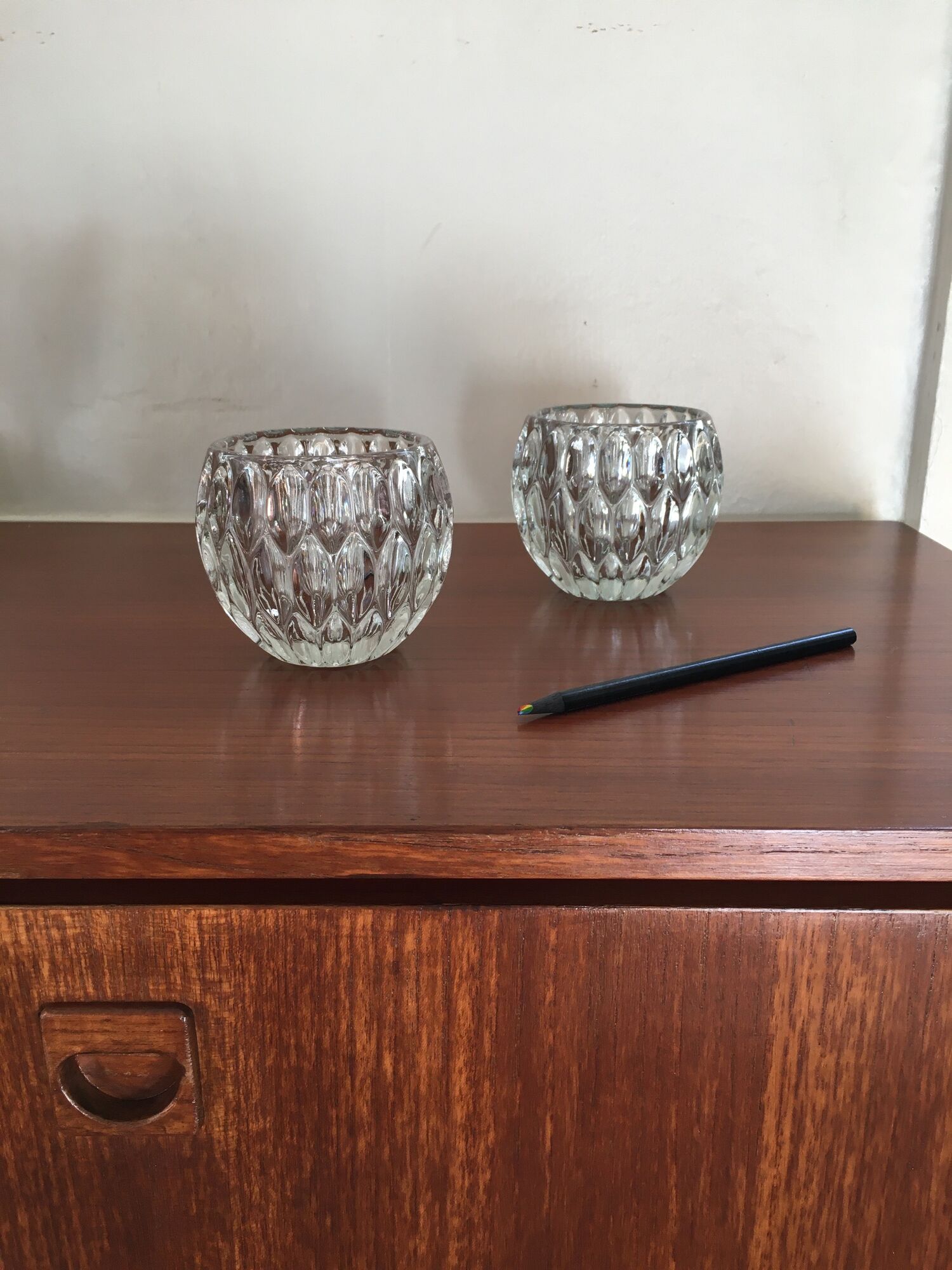 Duo of chiseled glass photophores