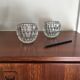 Duo of chiseled glass photophores
