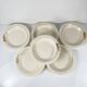 Set of 6 demi-deep plates from Longwy, early 20th century, floral decoration.
