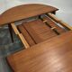 Scandinavian teak dining table with extension cords