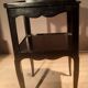 Black bedside table with two shelves, Louis XV style