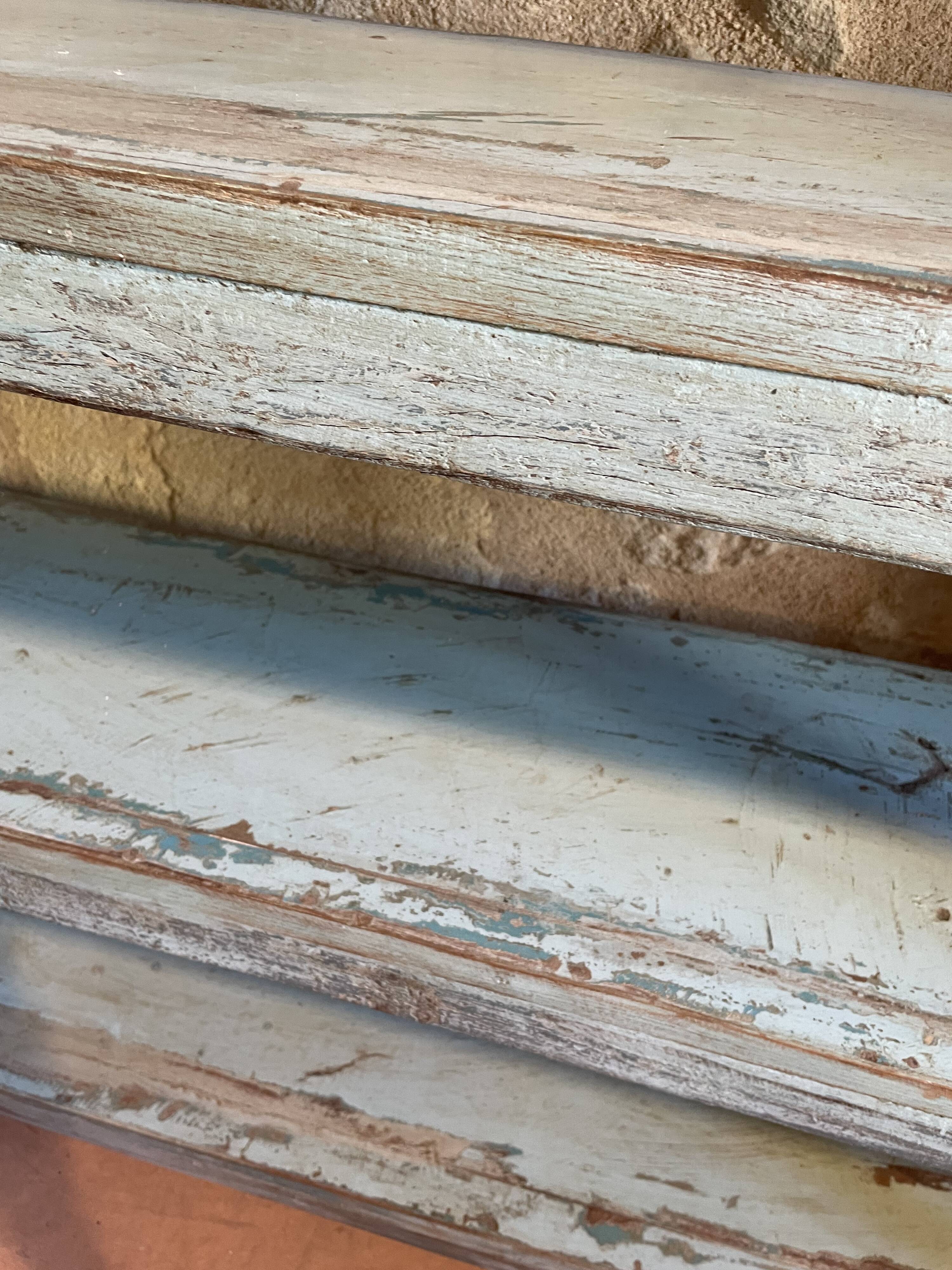 Blue lacquered teak shelves