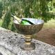 Ornate Floral Pedestal Champagne Cooler, brass ice bucket
