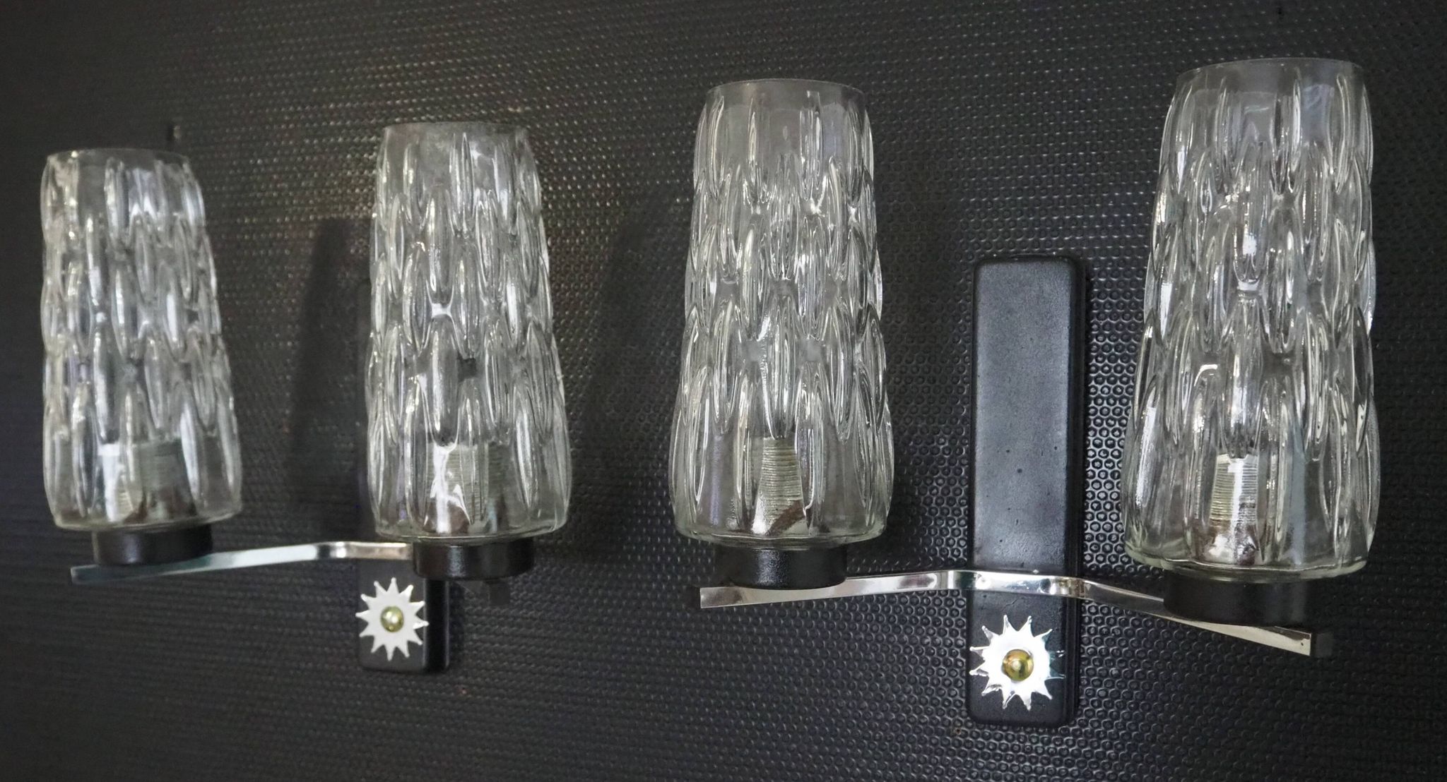Pair of wall lights from the 1950s-1960s with a push button switch.