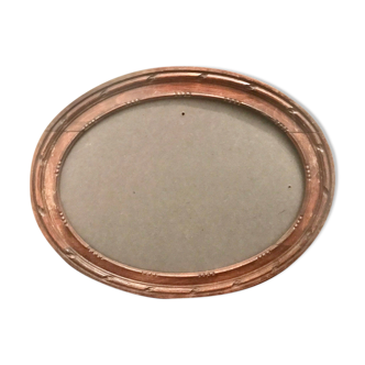 Carved wood oval frame