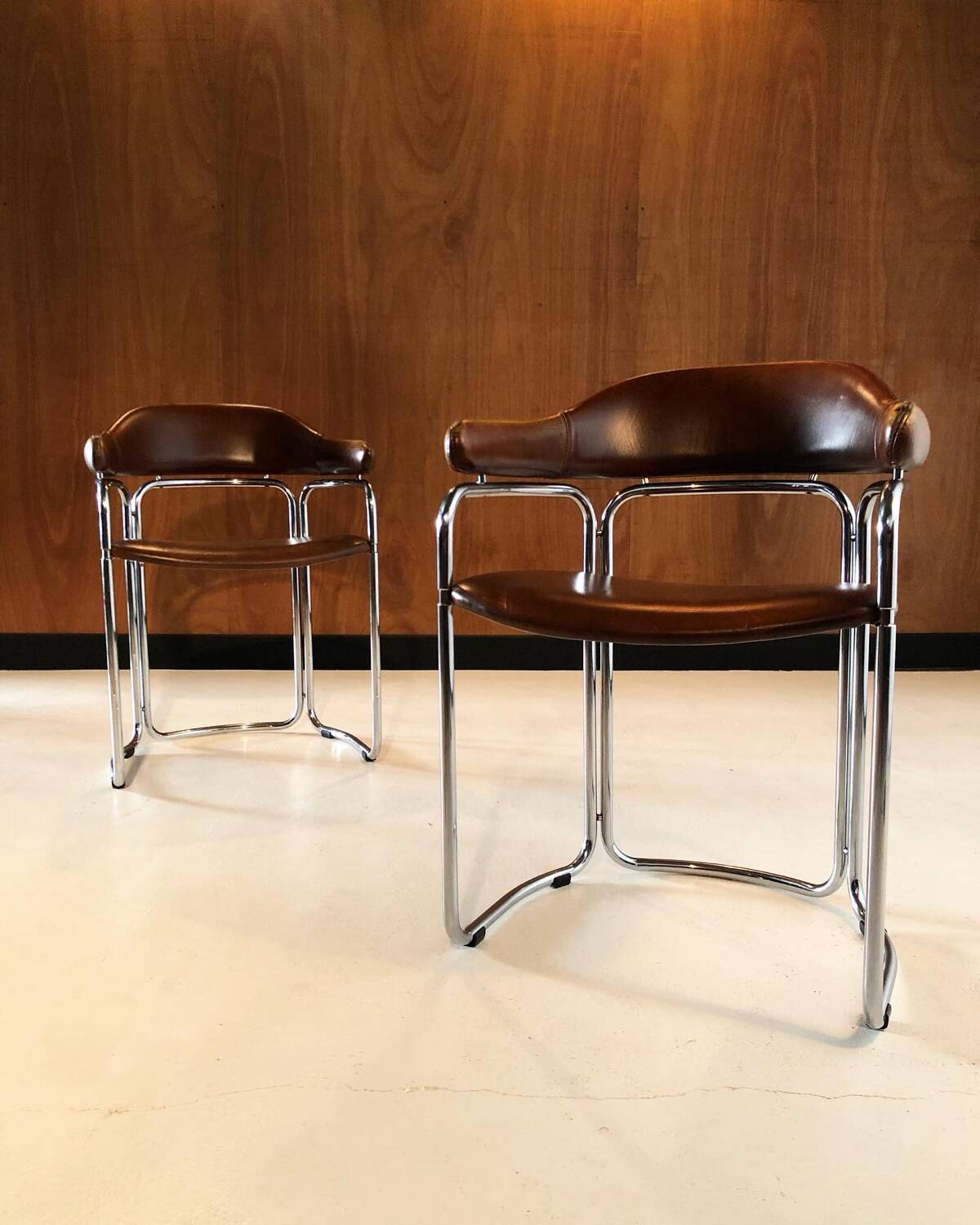 Pair of vintage armchairs, cognac leather and chrome steel 1970