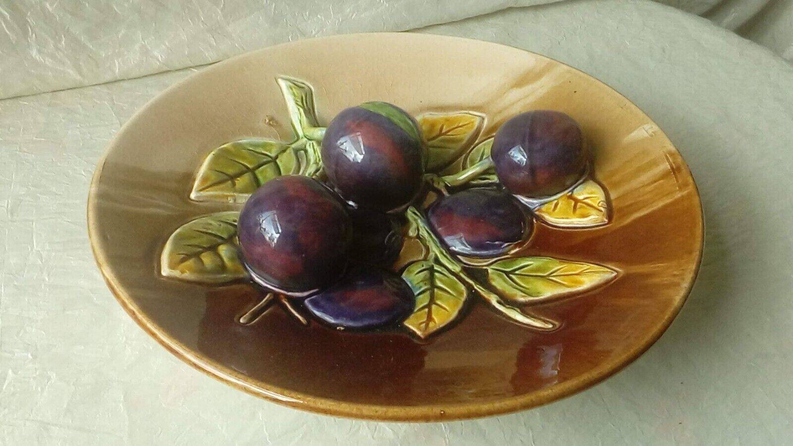 Ceramic plate barbotine trome eye plum late 19th