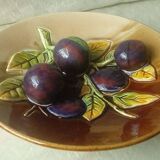 Ceramic plate barbotine trome eye plum late 19th