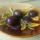 Ceramic plate barbotine trome eye plum late 19th
