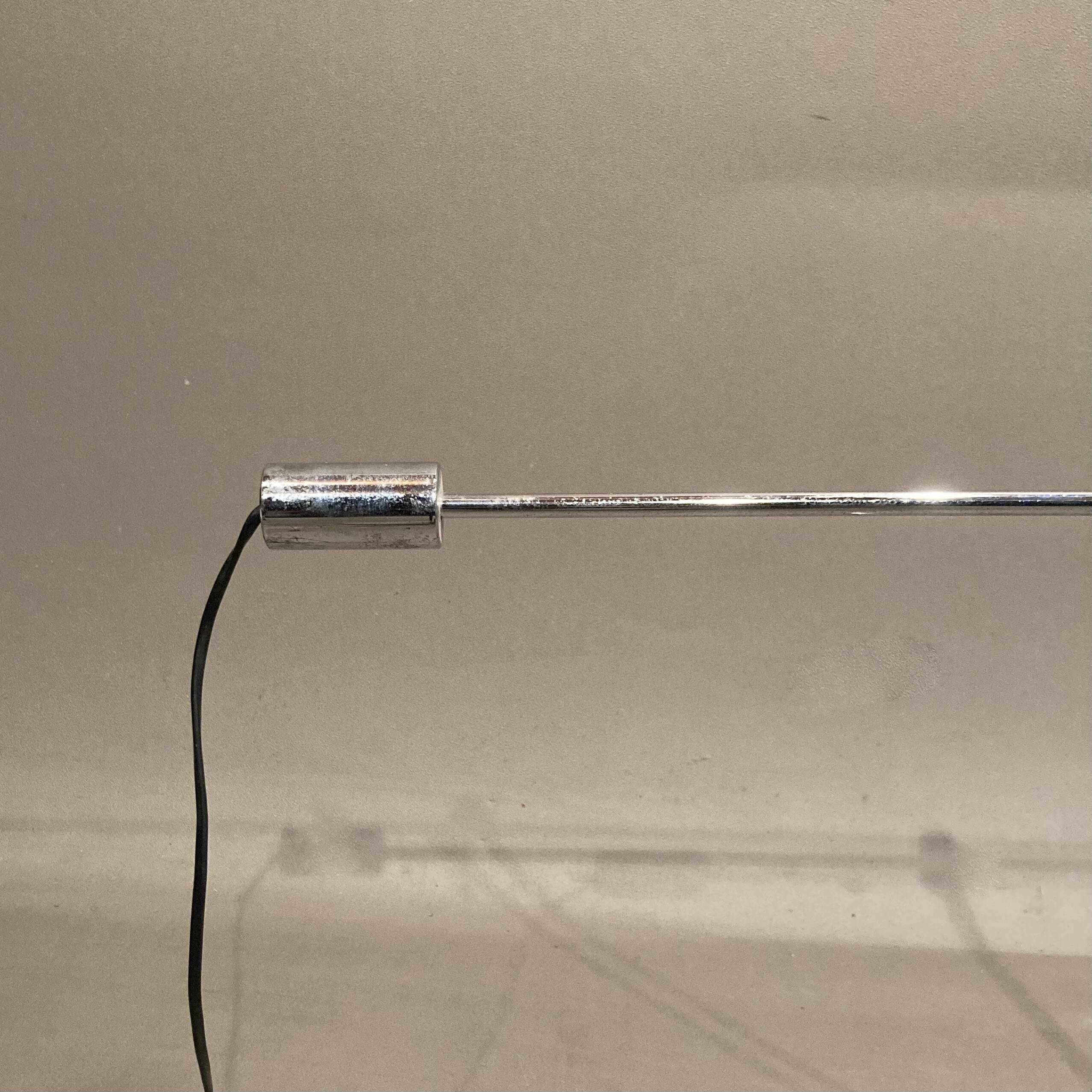 Large modular chrome lamp.