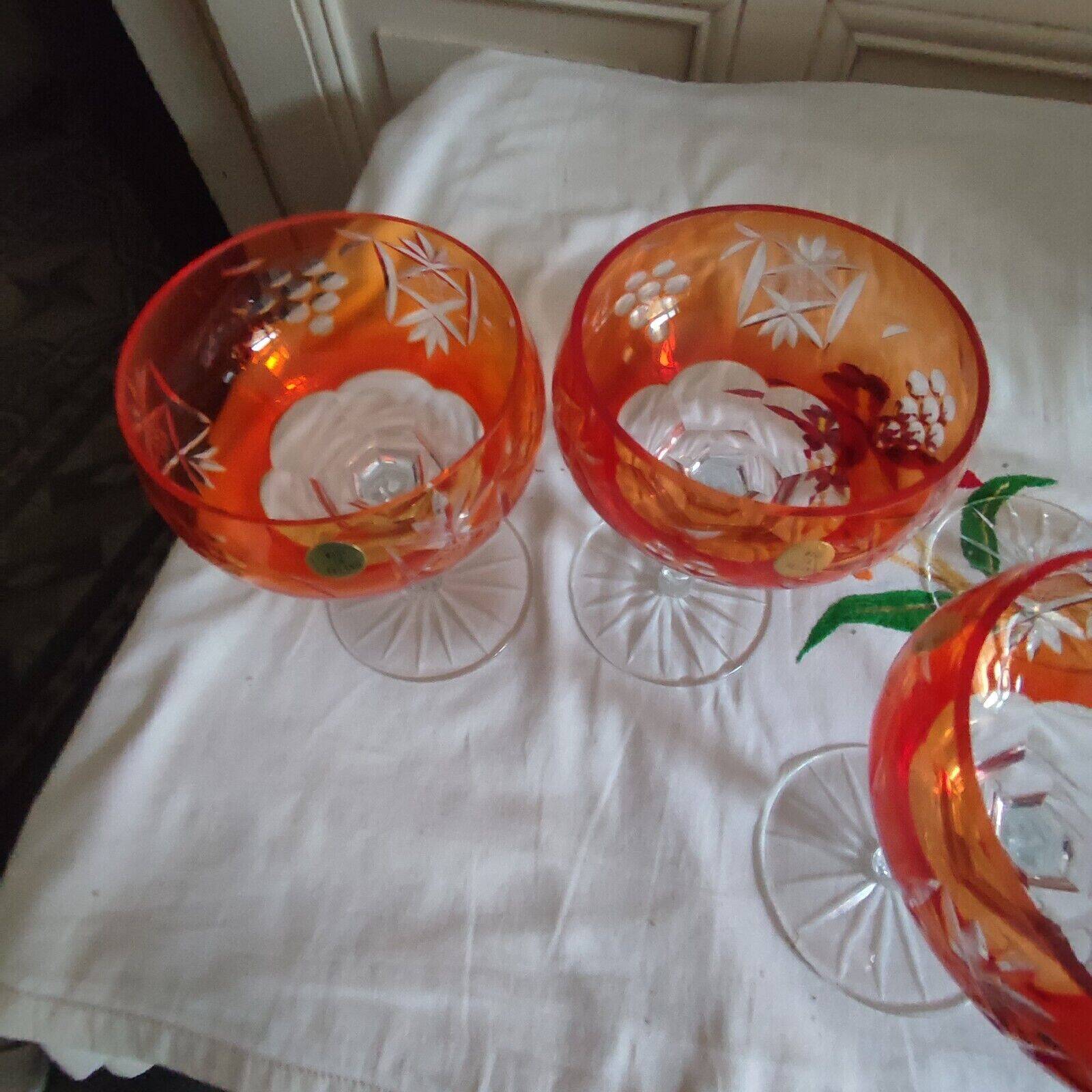 Five antique orange cut crystal champagne glasses with grape cluster decoration Poland