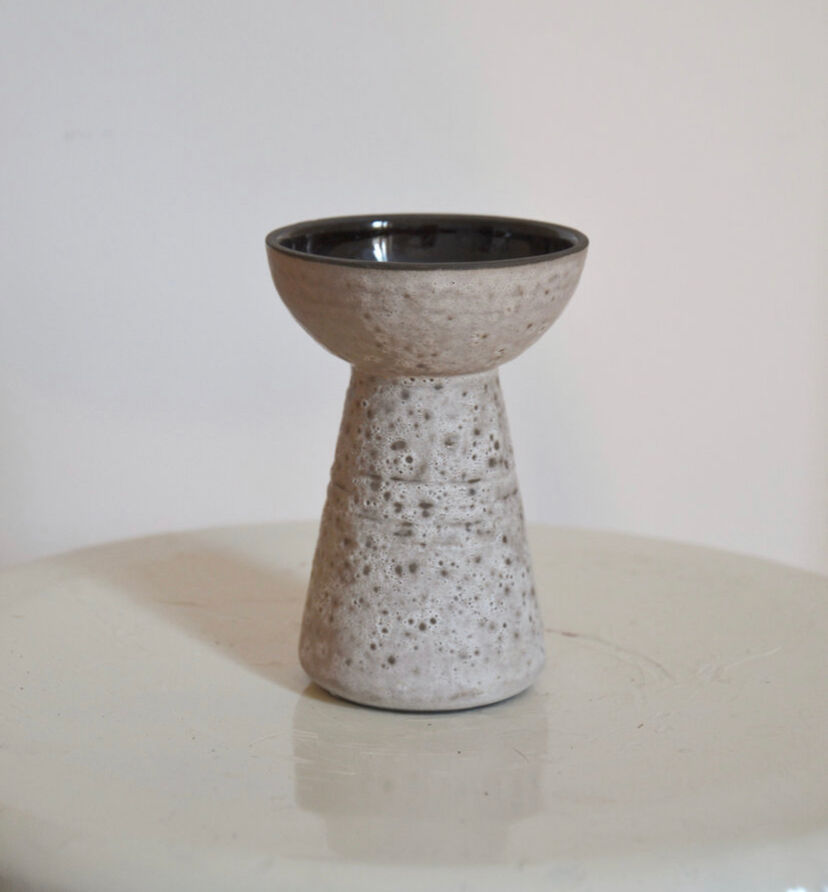 Minimalist gray ceramic vase in design shape