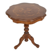 Pedestal table or side table, carved wooden legs, inlaid veneer on the top.