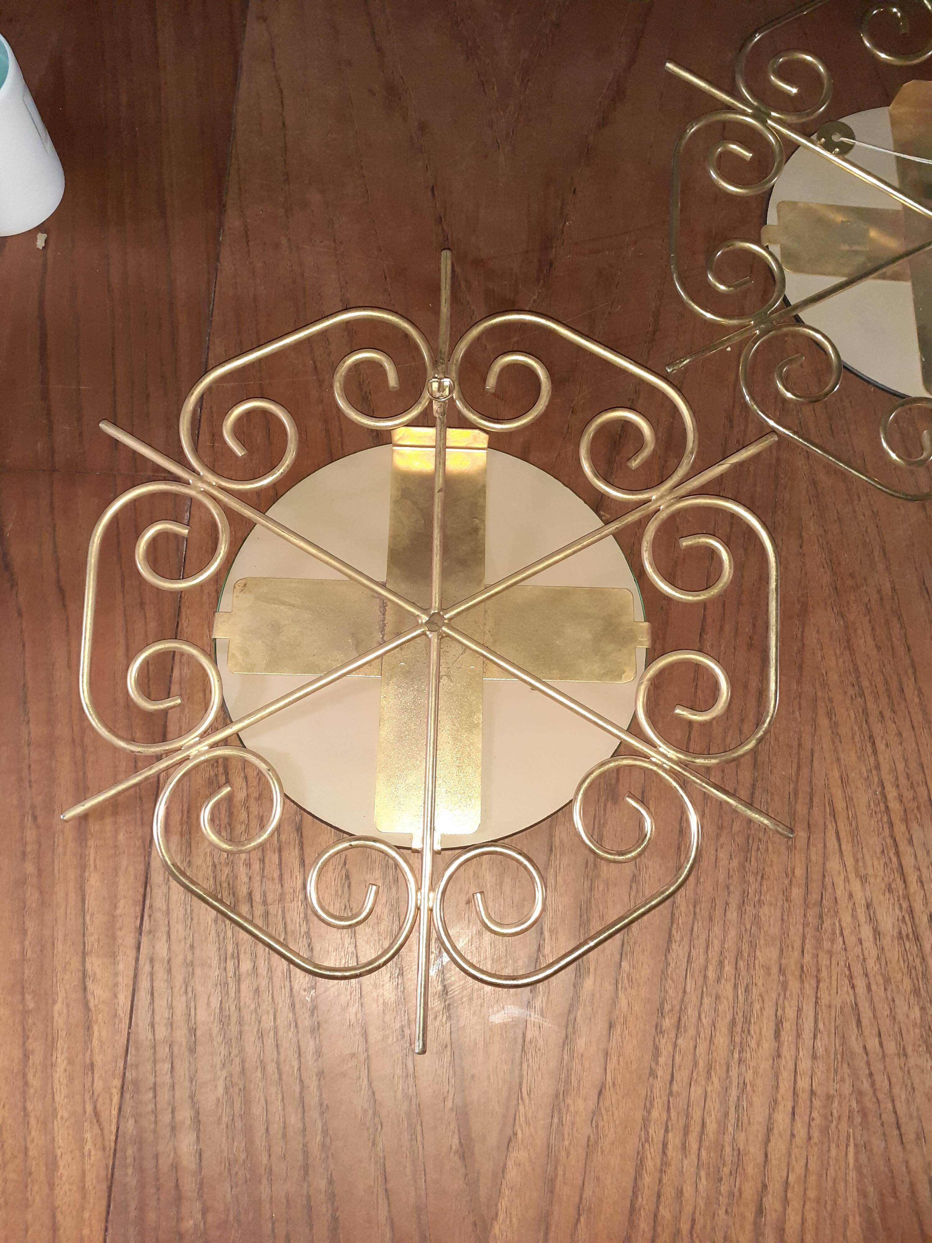 Pair of 60s golden metal mirrors