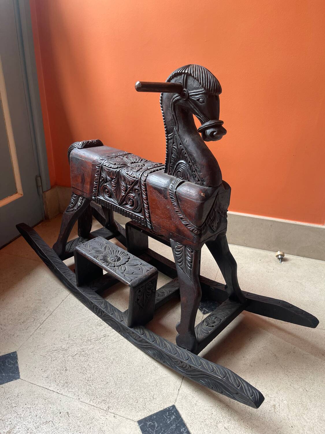 Antique carved wooden rocking horse