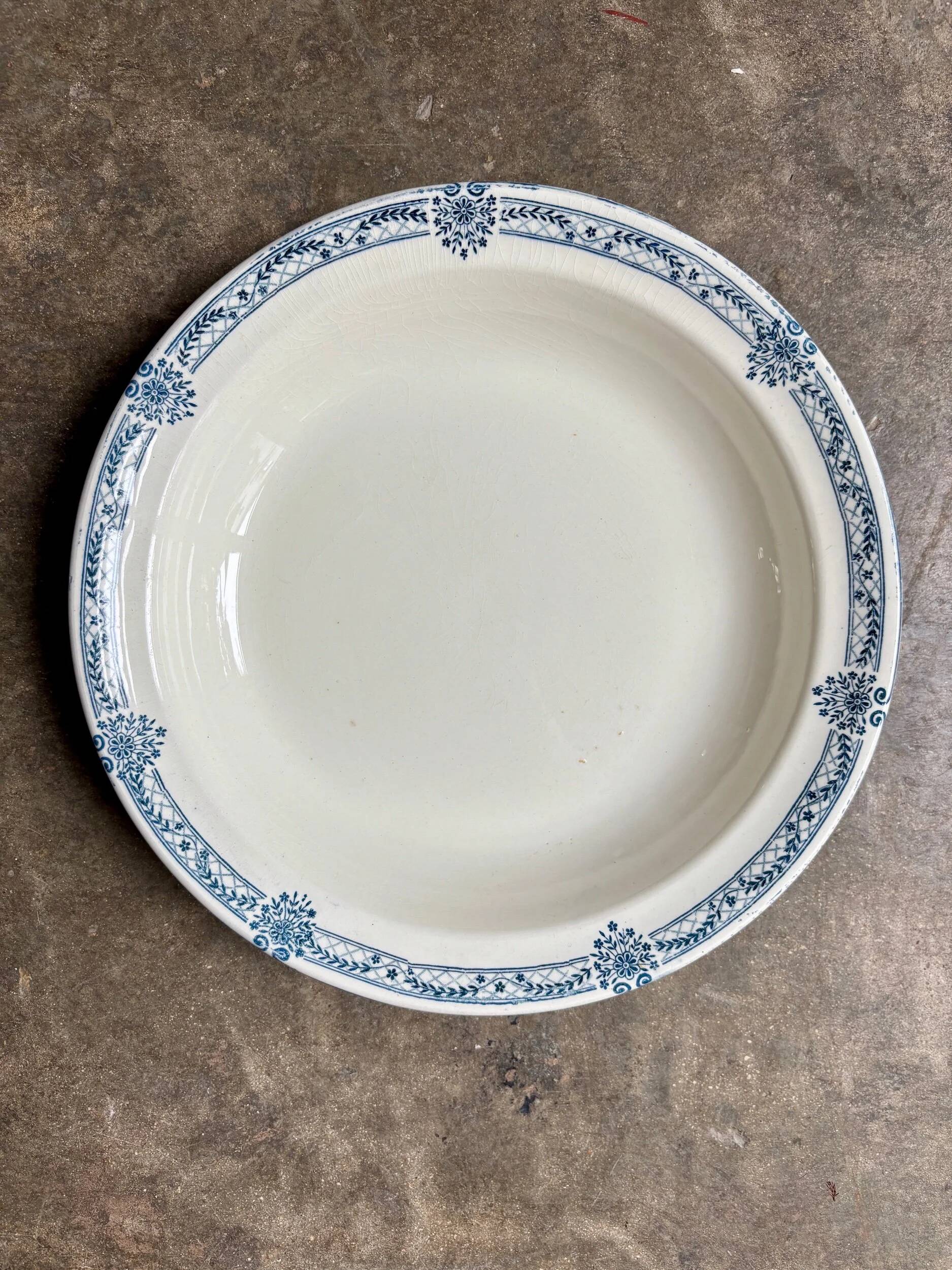 Salins round hollow dish in blue ironstone, "Arbois Ennege" service