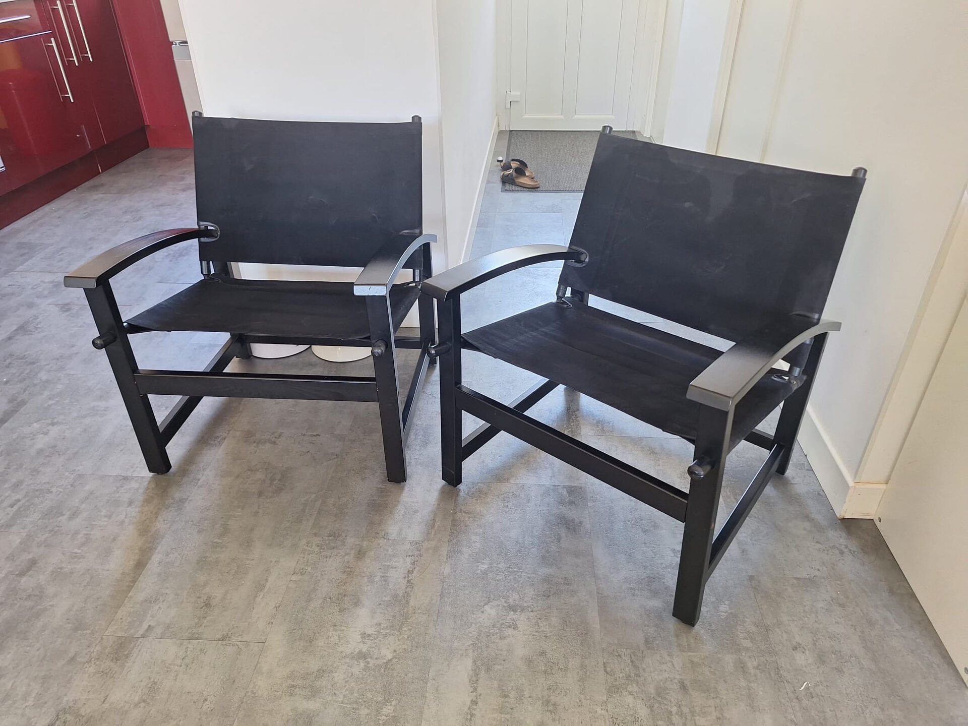 Pair of vintage "safari" style armchairs published by Hyllinge Møbler.