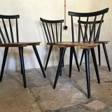 Set of 4 vintage 1960's chairs with bars and black compass legs