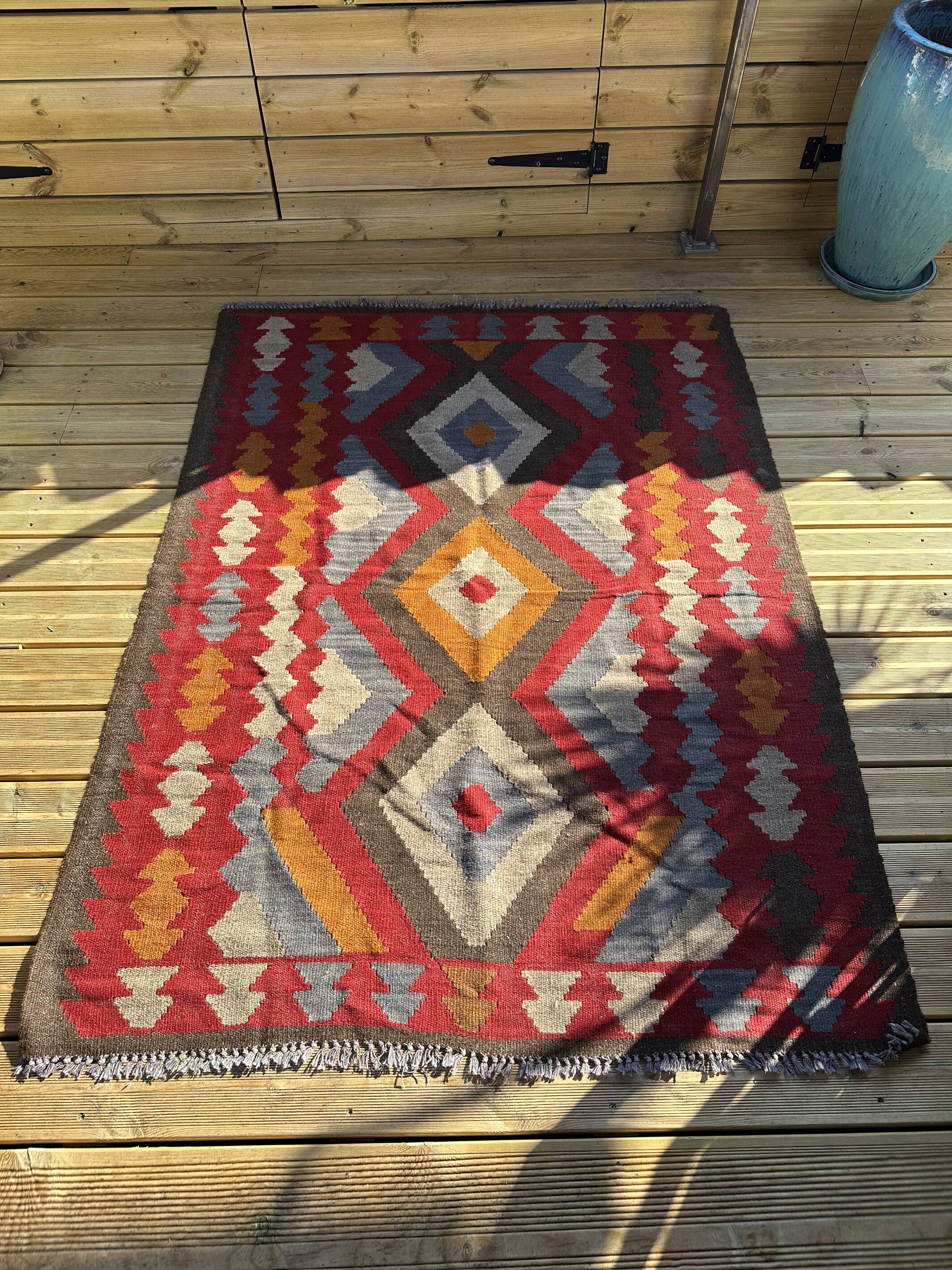 Multicoloured handmade wool kilim rug. Turkey, 1970s.