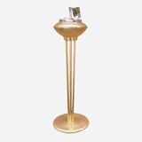 Old brass and chrome-plated metal ashtray on stand