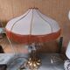 Large gilded brass lamp with white porcelain fleur-de-lis decoration