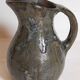 Potter's pitcher Art-popular in old enamelled earth