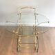 Neo classical style table in silver and gold metal and glass