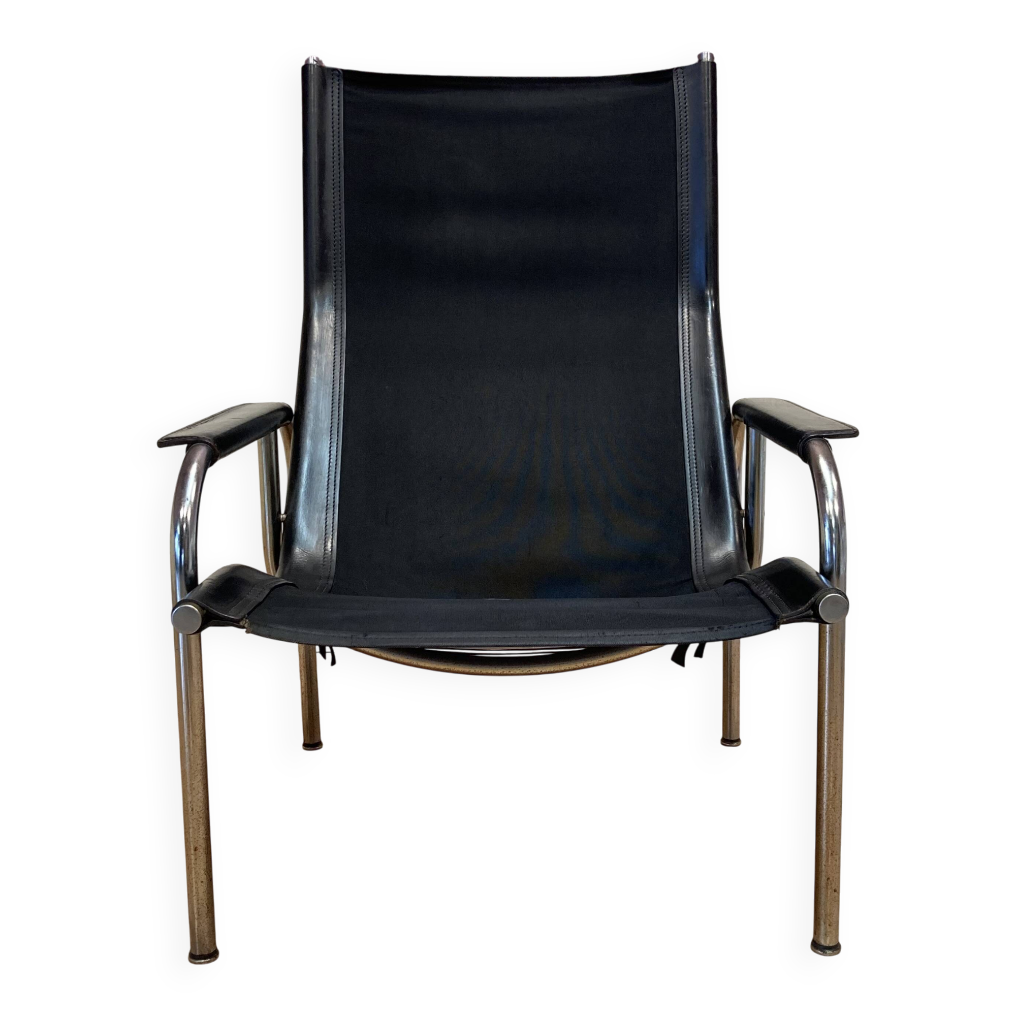 Reclining armchair in black leather and chrome design "hans eichenberger" 1960.