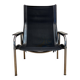 Reclining armchair in black leather and chrome design "hans eichenberger" 1960.